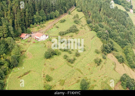 Aereal view of a traditional landscape of atlantic countryside with a traditional farm in the Basque Country. Spain. Stock Photo