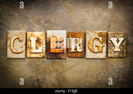 The word 'CLERGY' written in rusty metal letterpress type on an old aged leather background. Stock Photo