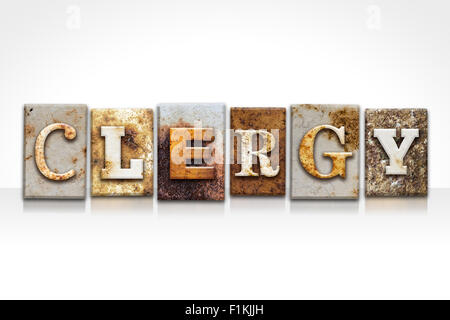 The word 'CLERGY' written in rusty metal letterpress type isolated on a white background. Stock Photo