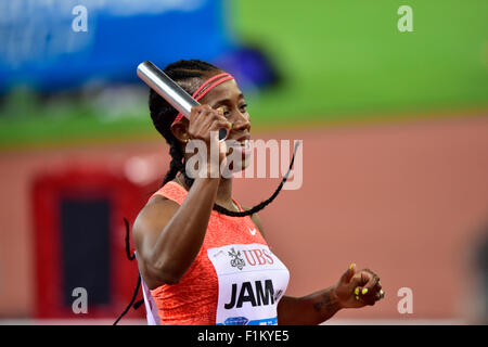 Zurich, Switzerland, 03rd Sep, 2015. Final runner Shelly-Ann Fraser-Pryce (JAM) holds up the baton after Jamaica's victory and new meeting record at the 4x100m women's relay at the 2015 IAAF Diamond League athletics meeting in Zurich. Credit:  Erik Tham/Alamy Live News Stock Photo