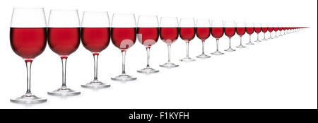 Multiple glasses of red wine receding into distance on white background Stock Photo