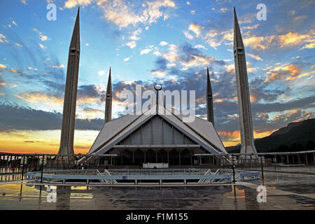 Faisal Mosque with a cloudy azure sky in the background. Stock Photo