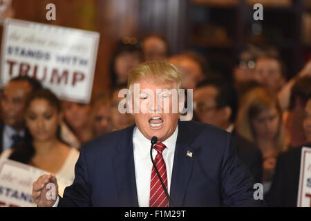 New York City, United States. 03rd Sep, 2015. Donald Trump listens to questions from press at Trump Tower. Republican candidate for president Donald Trump announced he had signed a pledge not to run as an independent candidate should he fail to win the party's nomination in 2016. Credit:  Andy Katz/Pacific Press/Alamy Live News Stock Photo