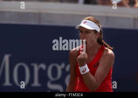 Britain's Johanna Konta celebrates a point en route to an upset  victory over Spain's Garbine Muguruza, the number 9 seed, during their second round match at the U.S. Open in Flushing Meadows, New York. Stock Photo
