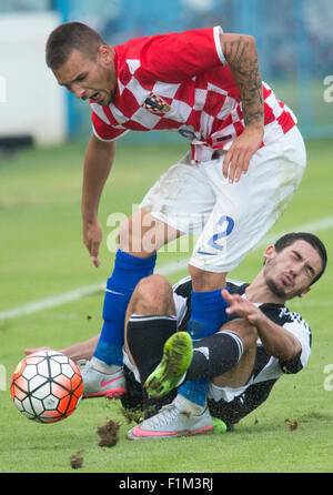 Dino Mikanovic of Hajduk Split and Amer Gojak of Dinamo Zagreb