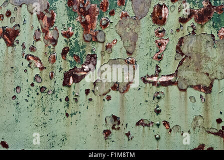 Flickering Grunge Background. Old rusty metal with scratches and cracks. Stock Photo