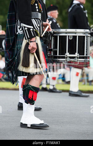 Drummers kilt, sporran and drum in a massed Pipe band at Floors castle. Kelso, Scotland Stock Photo