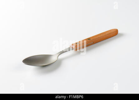 spoon with wooden handle on white background Stock Photo