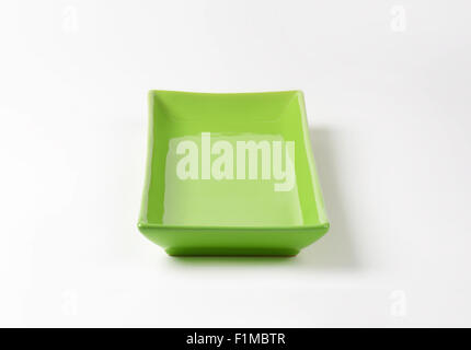 empty green tray on white background Stock Photo