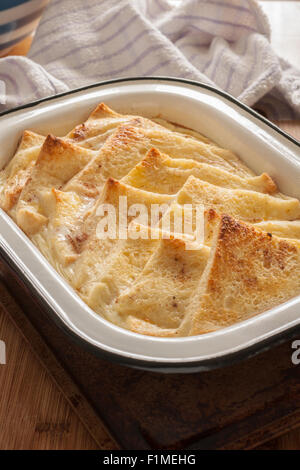 Bread and Butter Pudding a traditional British dessert made with bread eggs and milk Stock Photo