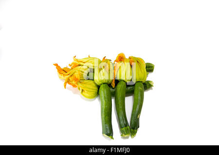 Arrangement of courgettes (zucchinis) on a white background Stock Photo