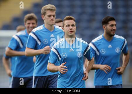 Frankfurt, Germany. 03rd Sep, 2015. Germany's Emre Can (r-l), Mario Goetze, Matthias Ginter and Thomas Mueller warm up during their training session in Frankfurt, Germany, 03 September 2015. Poland will face Germany in the UEFA EURO 2016 group D qualifying soccer match in Frankfurt on 04 September 2015. Foto: Fredrik von Erichsen/dpa/Alamy Live News Stock Photo