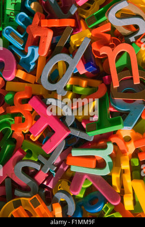 Assorted coloured letters as learning aids in primary school classroom, London, UK. Stock Photo