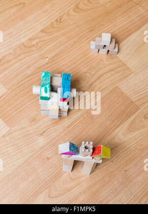 Upper view of a castle made by wooden pieces on the floor. Stock Photo