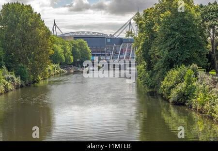 The River Taff in Cardiff showing the Millennium Stadium, south Wales, UK - NOW known as the Principality Stadium. Stock Photo