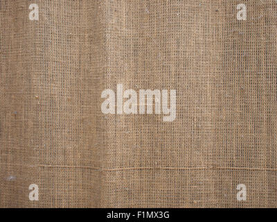The canvas of burlap texture with thick and coarse thread on the undulating surface for use as a background or wallpaper Stock Photo