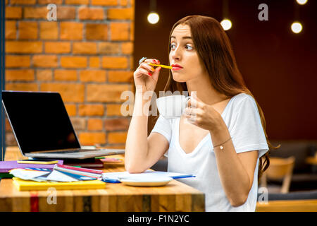 Working or studing in the cafe Stock Photo