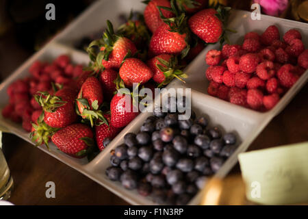 A selection of berries at Easter on a dining table Stock Photo