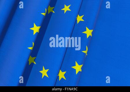European Union flag waving in the wind on blue sky background. 3D ...