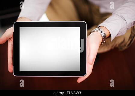 Tablet Computer Display - Tablet in Men's Hands. Blank Tablet Display (Copy Space) Technology Photo Collection. Stock Photo