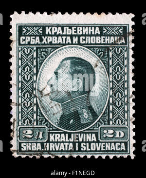 Stamp printed in Yugoslavia (Kingdom Serbia, Croatia and Slovenia) shows portrait of King Alexander I, circa 1924 Stock Photo