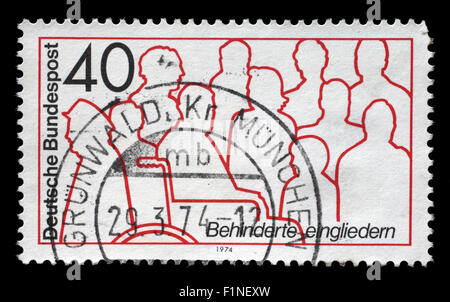 Stamp printed in Germany dedicated to integration of disabled, circa 1974 Stock Photo