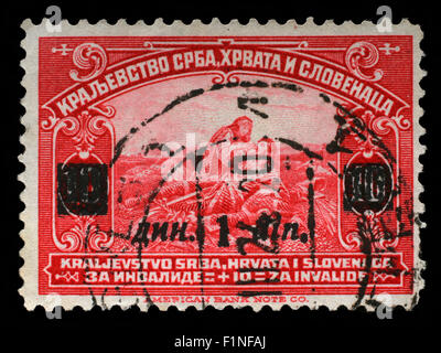 Stamp printed in Kingdom of Serbia, Croatia and Slovenia for the Benefit of Invalid Soldiers, circa 1921. Stock Photo