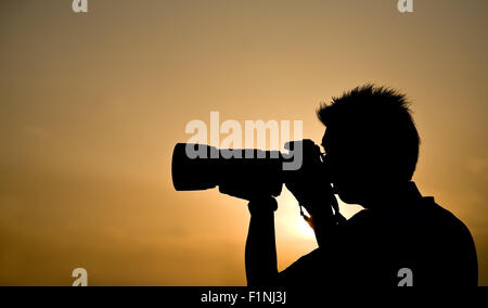 Photographer silhouette Stock Photo