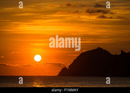 Dramatic red sunset sky over the ocean Stock Photo