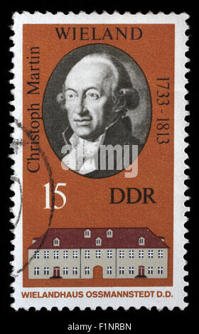 Stamp printed in the DDR (East Germany) shows Christoph Martin Wielandand and his house in Ossmannstedt, circa 1970 Stock Photo