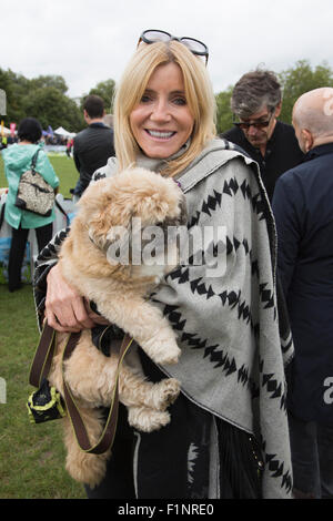 Primrose Hill, London, UK. 5 September 2015. Actress Michelle Collins. PupAid 2015 Celebrity vet Marc Abraham's one-day festival for dog owners and pooch enthusiasts hopes to raise awareness of puppy farming, which is the mass production of puppies for commercial gain and sometimes involves the animals living in terrible conditions. Photo: Nick Savage/Alamy Live News Stock Photo