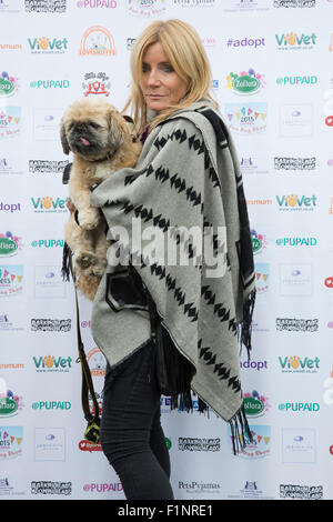 Primrose Hill, London, UK. 5 September 2015. Actress Michelle Collins. PupAid 2015 Celebrity vet Marc Abraham's one-day festival for dog owners and pooch enthusiasts hopes to raise awareness of puppy farming, which is the mass production of puppies for commercial gain and sometimes involves the animals living in terrible conditions. Photo: Nick Savage/Alamy Live News Stock Photo