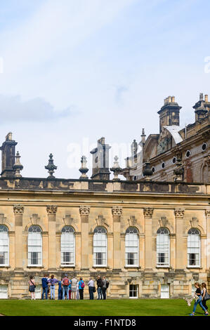 A group of tourists on a guided tour. Castle Howard, York, England. Stock Photo