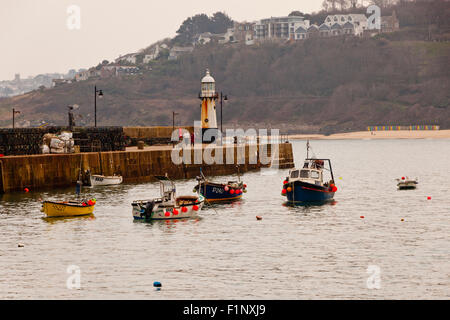 The historic lighthouse on the end of the breakwater in St Ives harbour, Cornwall, England, UK Stock Photo