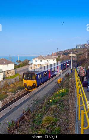 A St Ives to St Erth branch line train leaving Carbis Bay station, Cornwall, England, UK Stock Photo