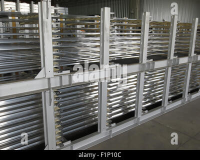 Aluminum lines stock rack in a factory. Stock Photo