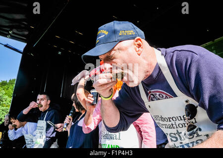 Hillsborough, Northern Ireland. 5 SEP 2015 - Amateurs attempt to eat 30 oysters in one minute at Hillsborough International Oyster Festival. Credit:  Stephen Barnes/Alamy Live News Stock Photo