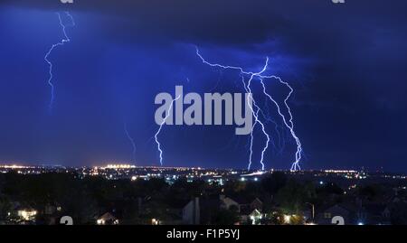 Lightning Storm Over South-West Colorado Springs, Colorado, USA. Overnight Heavy Thunderstorm - City, Storm Cloudscape and Few L Stock Photo