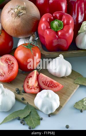 Vegetables Vertical Studio Photo. Vegetables like Onion, Garlic, Tomatoes and Red Paprikas. Fresh Vegetables. Stock Photo