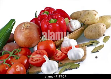 Fresh Produce -Fresh Vegetables. Tomatoes, Onions, Garlic, Red Paprikas. Organic Vegetables Isolated on White. Food Photo Collec Stock Photo