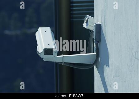 CCTV Security Cameras on the Building Wall. Visual Security System. Technology Photography Collection. Stock Photo