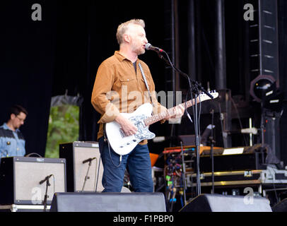 Brighton, UK. 5th September, 2015. Billy Bragg, the left leaning singer songwriter on stage at the first Together the People festival in Preston Park. The festival features a mix of music, theatre and activism within this eclectic city with the UK's only Green MP. Credit:  Scott Hortop/Alamy Live News Stock Photo