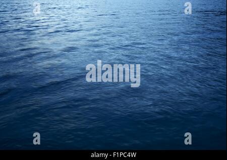 Lake Blue Water - Lake Crescent Dark Blue Water Photo Background. Stock Photo