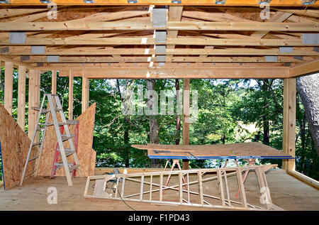 Construction in progress, building a porch addition onto a house. Stock Photo