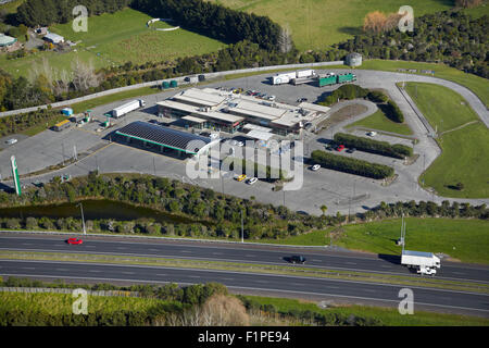 Service Station and Northern Motorway, Dairy Flat, Auckland, North Island, New Zealand - aerial Stock Photo