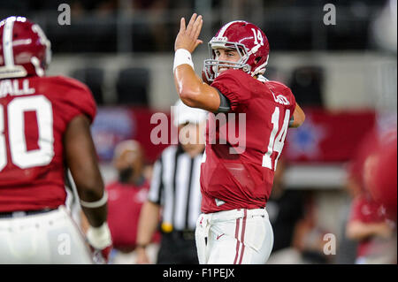 Alabama Quarterback Jake Coker (14) Taks With Coaching Staff On The 