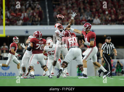 Arlington, Texas, USA. 5th September, 2015. Alabama Crimson Tide quarterback Jake Coker #14 passes in the first quarter in an NCAA Advocate Classic Football game between the Wisconsin Badgers and the Alabama Crimson Tide at AT&T Stadium in Arlington, TX Albert Pena/CSM Credit:  Cal Sport Media/Alamy Live News Stock Photo