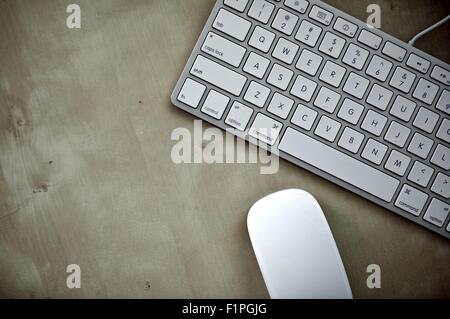 Modern Keyboard and Mouse - Wood Desktop. Computers Photo Collection Stock Photo