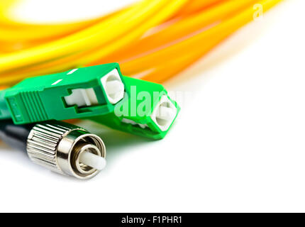 Fiber optic cable link plug connector isolated on white Stock Photo