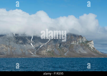Norway, Barents Sea, Svalbard, Spitsbergen, Trygghamna Fjord, Alkhornet on the northern side of the mouth of Isfjord. Stock Photo